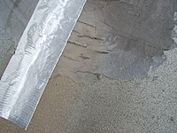 cracked tar in old repair